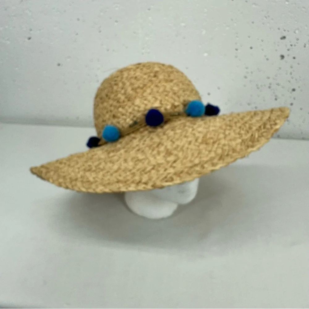 Pool to Party by Subtle Luxury Wide Brim Straw Floppy Sun Hat with Blue Pom Poms